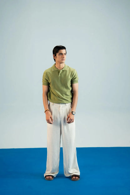 Olive textured knit polo shirt with button placket and short sleeves
