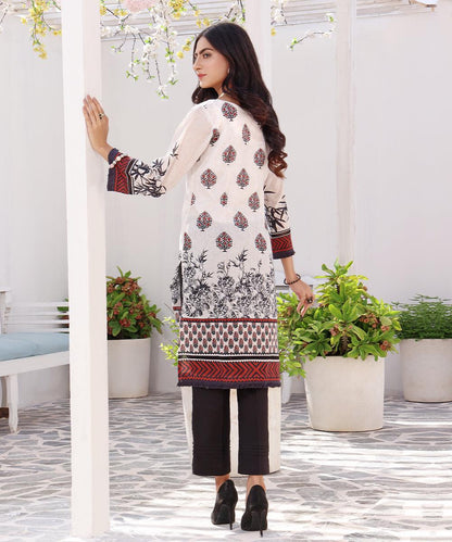 White printed long kurta tunic with red-black geometric border on hem