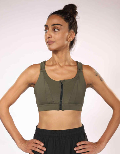 Olive green zip-front sports bra with wide shoulder straps