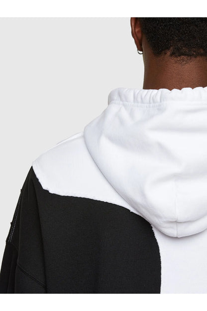Hooded sweatshirt with white body and black sleeve panel, ribbed hem and cuffs