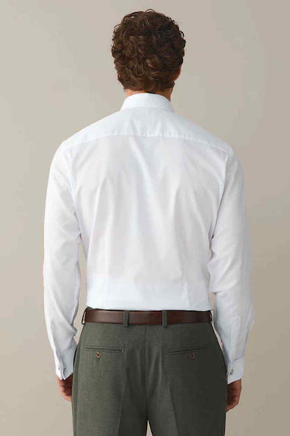White dress shirt back view with buttoned cuffs
