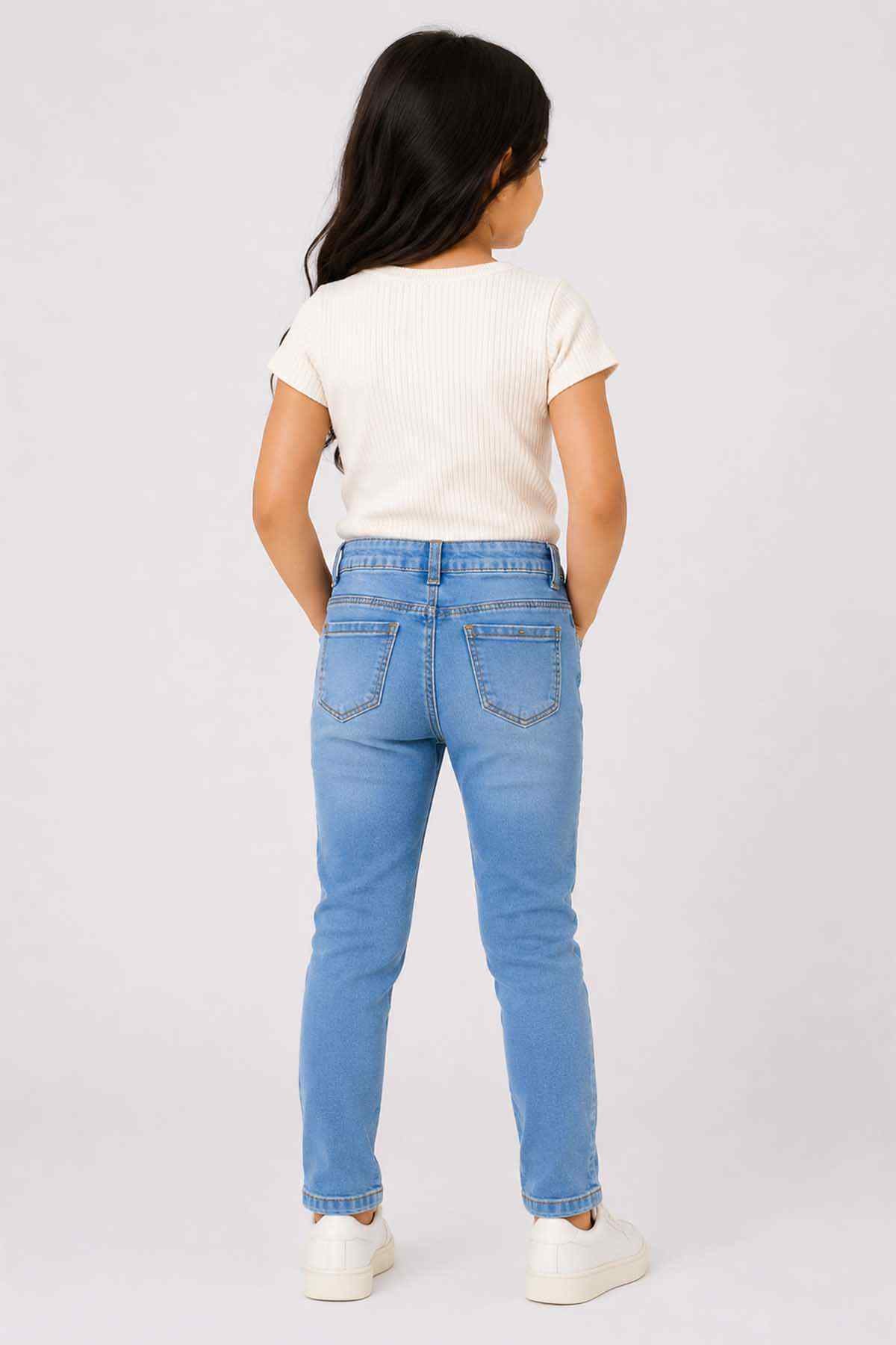 Kids blue denim jeans back view with patch pockets and belt loops