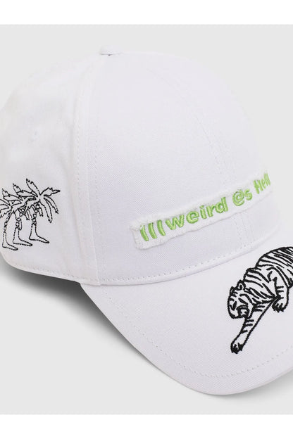 Diesel white cap close-up, embroidered palm and green "weird girl" logo, curved brim