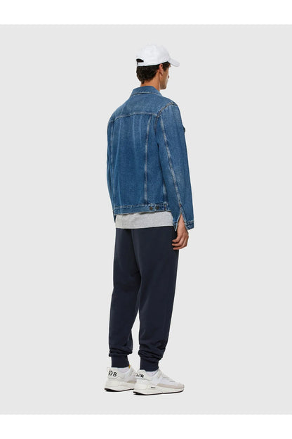 Diesel logo jogger pants, dark navy, side view with cuffed ankle hems