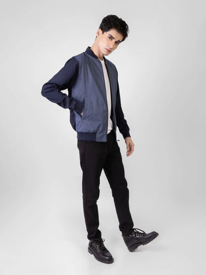 Men's blue striped bomber jacket with stand collar and zip front, long sleeves