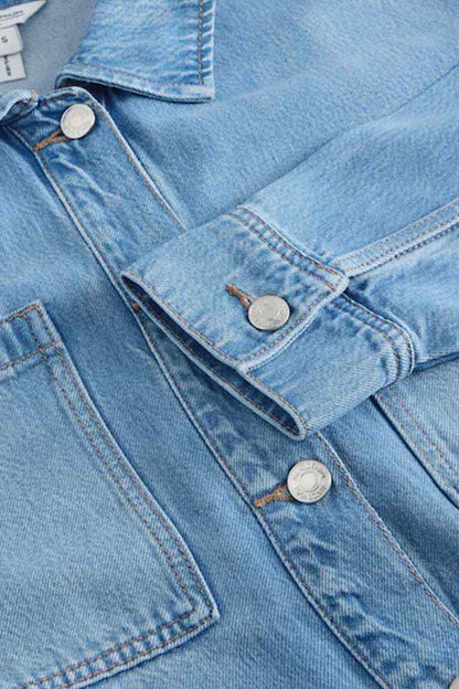 Next mid blue denim jacket sleeve cuff with button and metal snaps