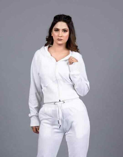White zip-up hoodie and joggers with drawstring waist and front pockets.