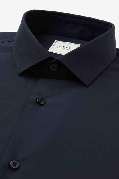 Navy dress shirt collar and button placket with dark buttons.