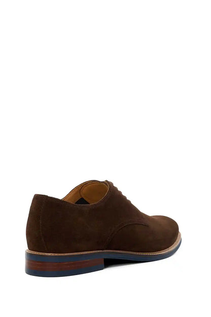 Brown suede lace-up shoe with low heel and blue-and-orange sole trim