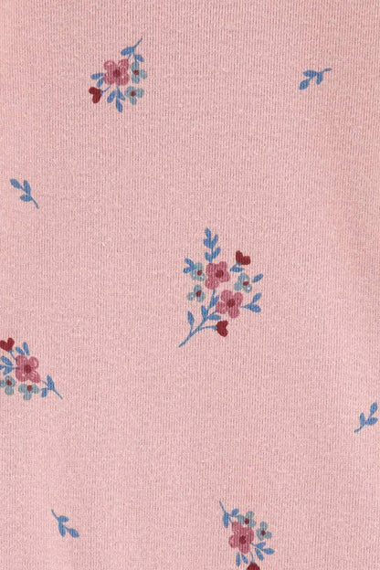 Pink long-sleeve bodysuit fabric with small blue and pink floral prints