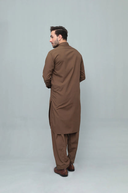 Men's brown long kurta and shalwar trousers, back view