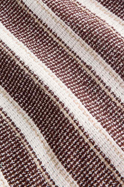 Close-up of brown and white vertical stripe textured fabric