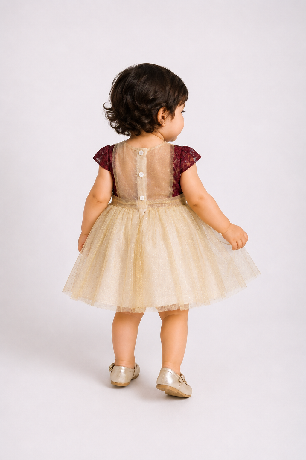 Baby dress back on baby: beige buttoned yoke, burgundy lace sleeves, tulle skirt