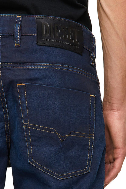 Blue denim jeans with Diesel logo patch and contrast-stitched back pocket