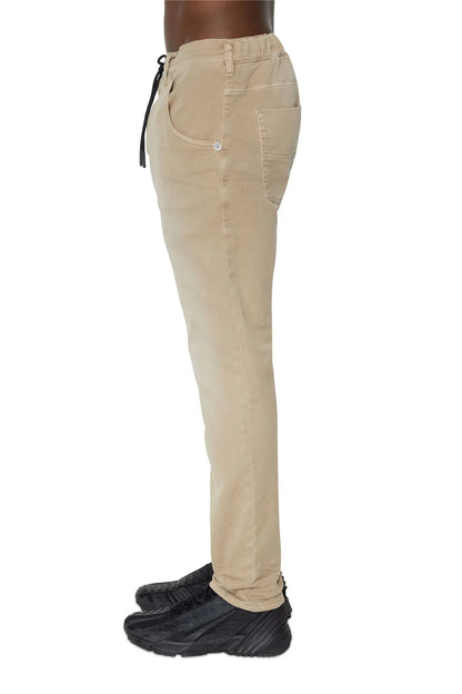 Khaki jeans back view with drawstring waistband and tapered legs