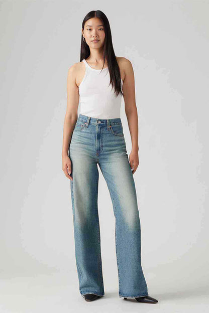Blue denim wide-leg jeans, button-zip front