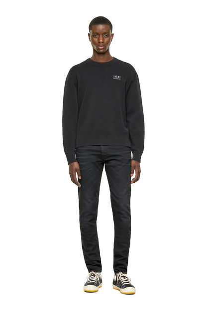 Diesel black crewneck sweatshirt with small chest logo patch, full body view