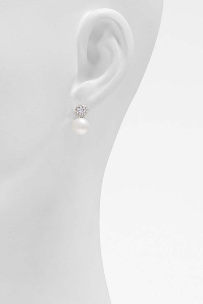 Silver-tone stud earring with small crystal cluster and round pearl drop