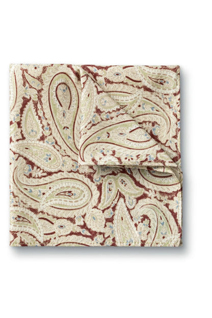 Paisley pocket square in cream and rust with detailed paisley motifs