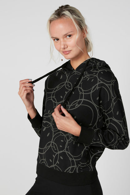 Black patterned pullover hoodie with adjustable drawstring hood and kangaroo pocket