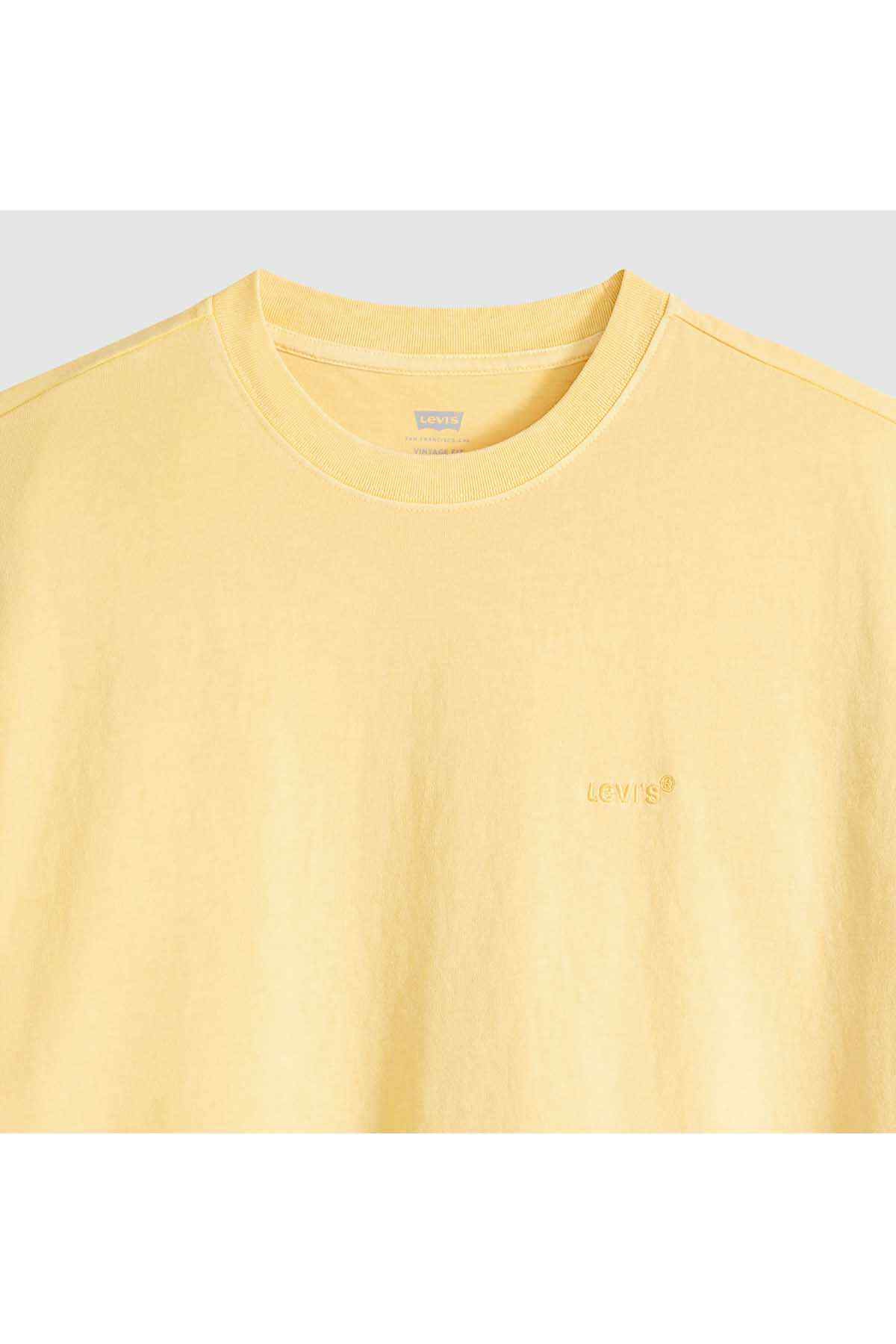 Levi's yellow crewneck T-shirt with chest logo, close-up