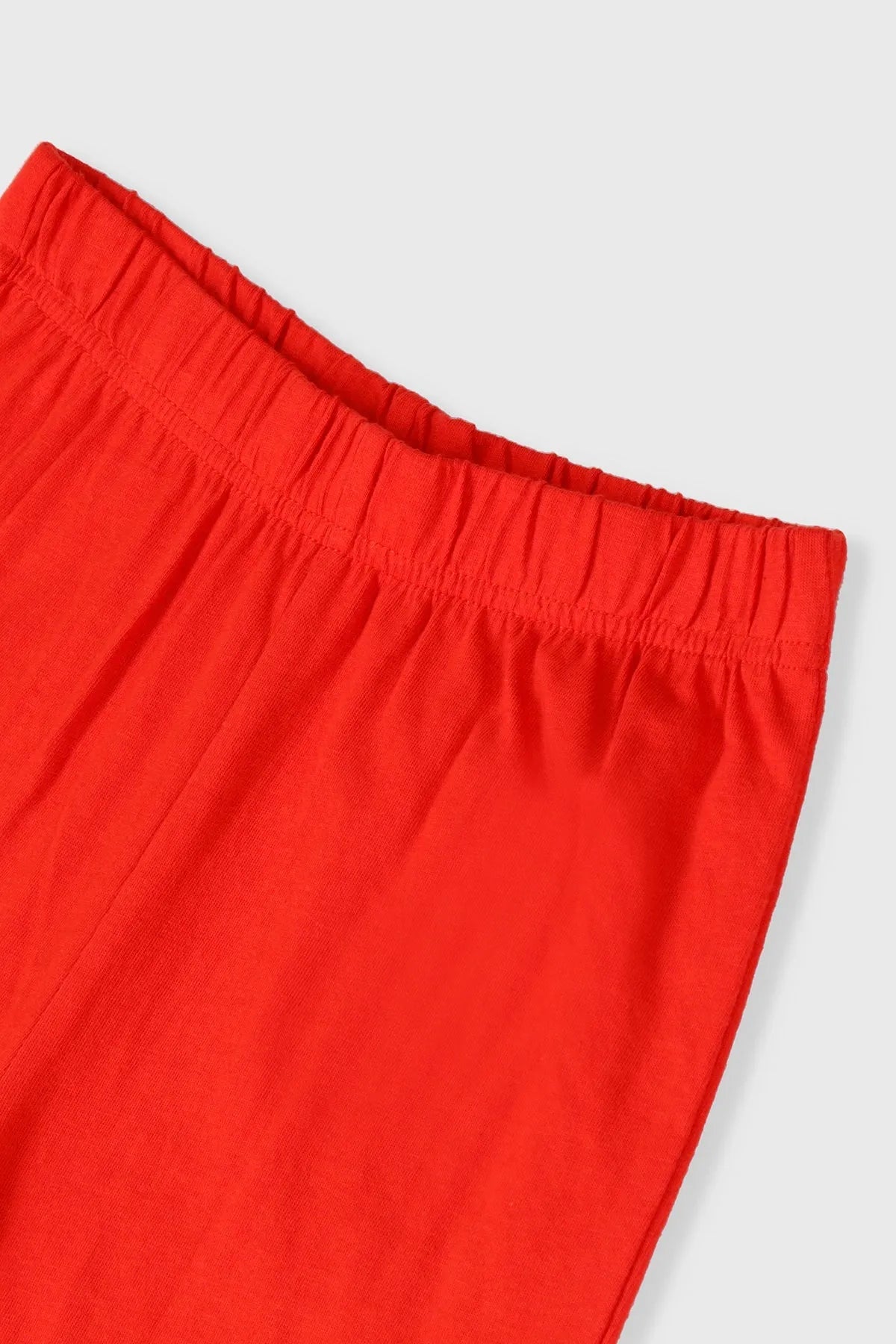 Red elastic-waist jogger pants with cuffed hems