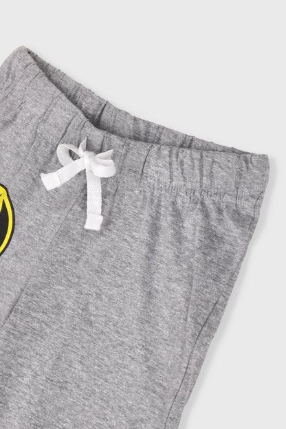 Kids' gray shorts with white ribbon tie, Batman logo partially visible at left