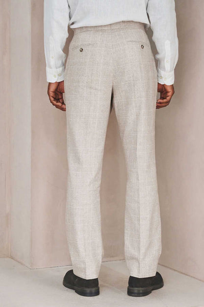 Men's light beige suit trousers with pleat front and buttoned fly, full length