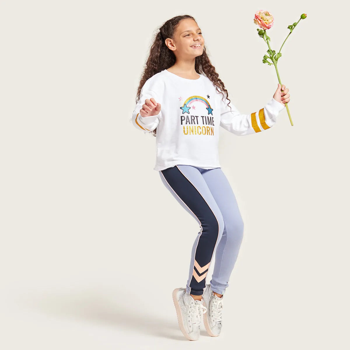 Kids unicorn graphic sweatshirt and light blue leggings with navy side stripe