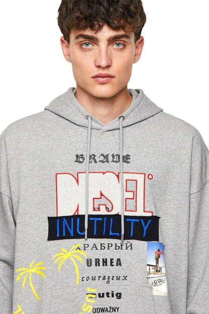 Grey hoodie close-up with drawstring hood and colorful front graphic print