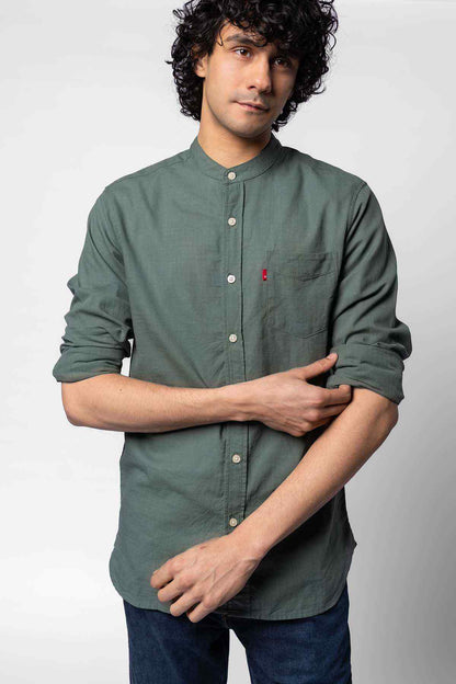 Men's green long-sleeve button-up shirt with chest pocket and button front