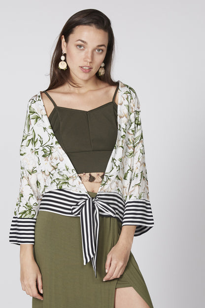 Floral kimono layer over olive maxi dress, striped waist tie, V-neck bodice