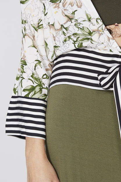 Floral sleeve and striped hem on olive maxi dress with waist tie detail