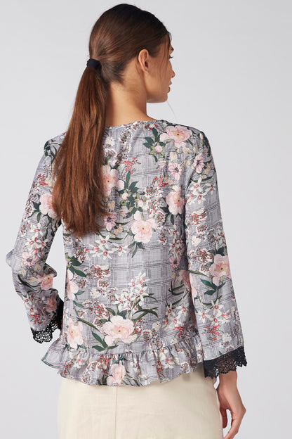 Grey floral blouse with lace-trim hem and gathered back detail