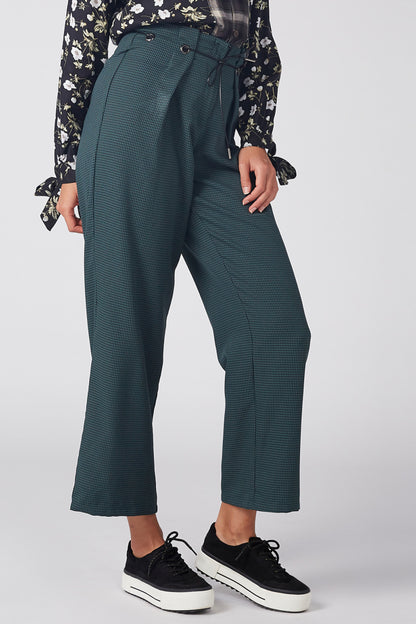 Teal wide-leg pants with drawstring waist, buttoned front, and side pockets