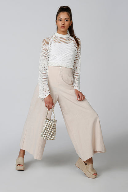 Beige high-rise wide-leg pants with relaxed fit and long straight legs