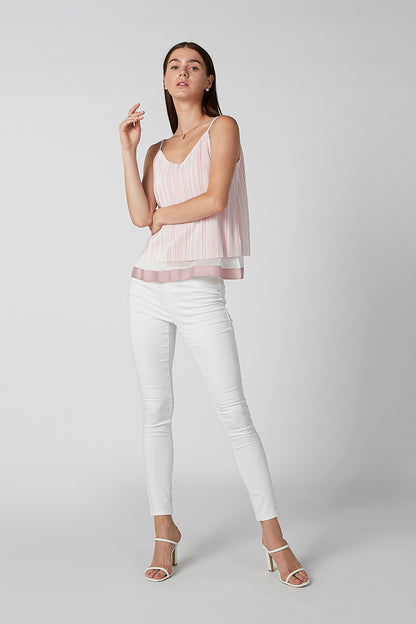 Pink striped sleeveless camisole top with V-neck and pink ruffle hem, full view