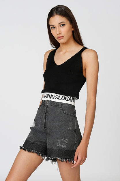 Splash black sleeveless V-neck tank with gray distressed denim shorts, frayed hem