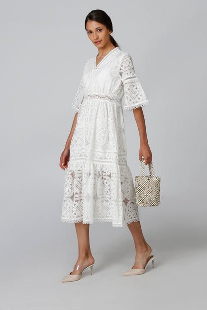 White lace tiered midi dress with V-neck and patterned trim, 3/4 bell sleeves