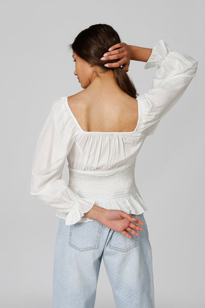 White peasant blouse with square open back and long gathered sleeves, smocked waist