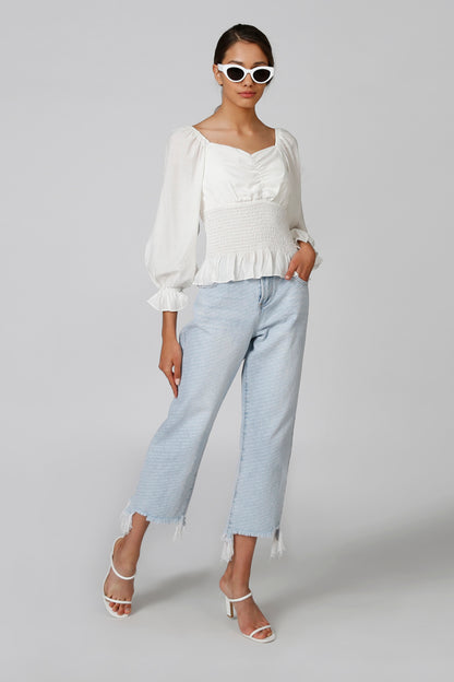 White peasant blouse, gathered front bodice and smocked waist with cuffed sleeves