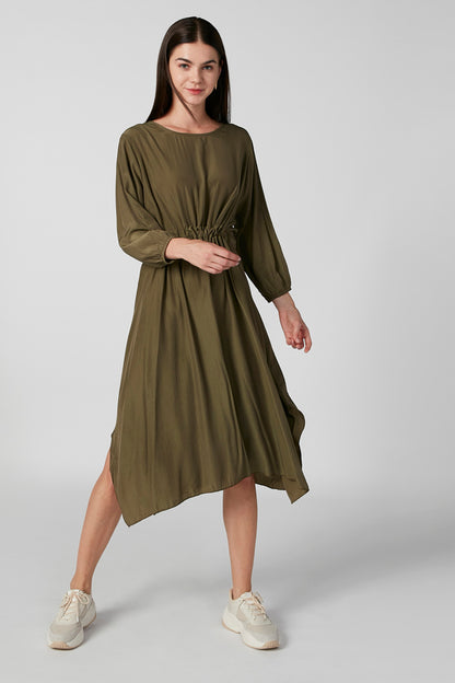 Olive green long-sleeve midi dress with gathered waist and asymmetrical hem