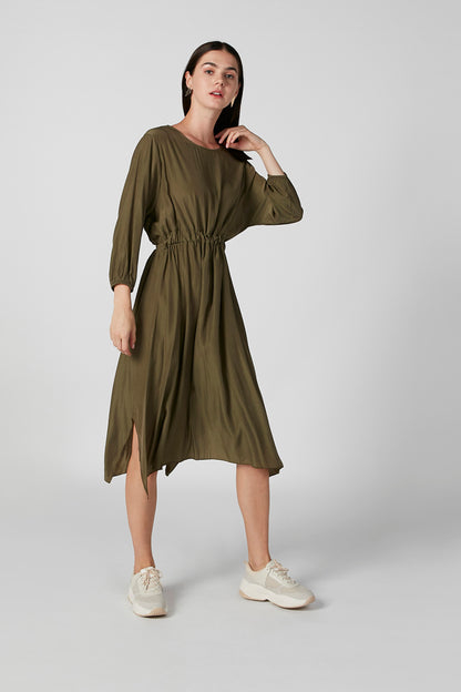 Olive green long-sleeve midi dress with elastic cuffs, gathered waist, side-slit hem
