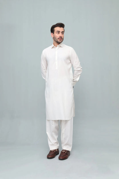 Men's white shalwar suit with long kurta and shalwar, front standing view
