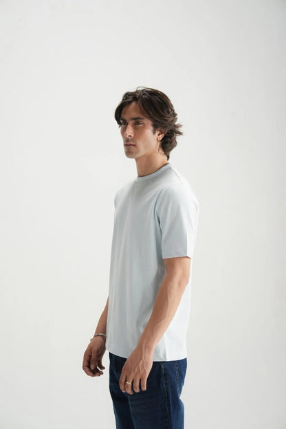 Light blue crew-neck short-sleeve T-shirt on model, front side view