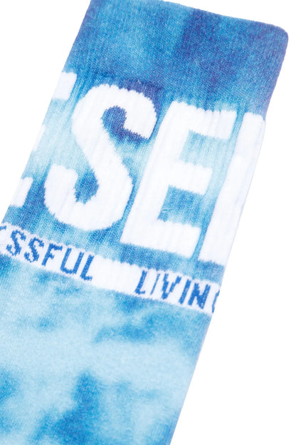Blue crew sock close-up with large white DIESEL text and 'SUCCESSFUL' below
