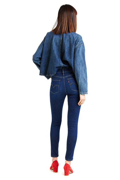Back view blue denim jacket and skinny jeans set