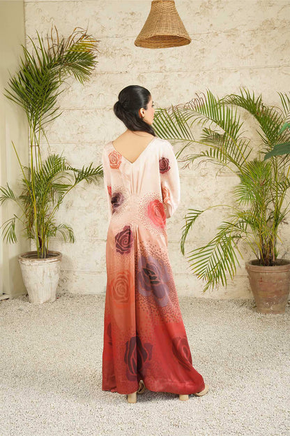 Blush pink maxi dress with V-neck and long sleeves, maroon back print; rear view
