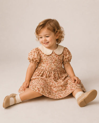 Toddler floral dress with gathered waist and short puff sleeves