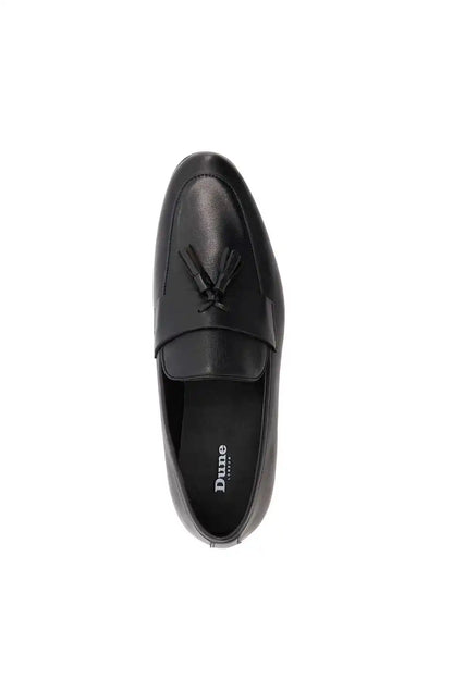 Black Dune London loafer with tassel fringe, front side view